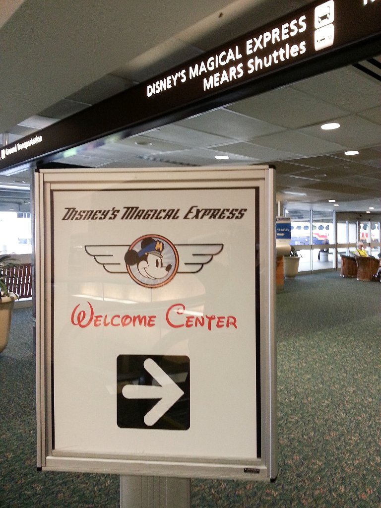 2013-04-13 18.05.21.jpg - Ready to board the Magical Express at Orlando Airport.